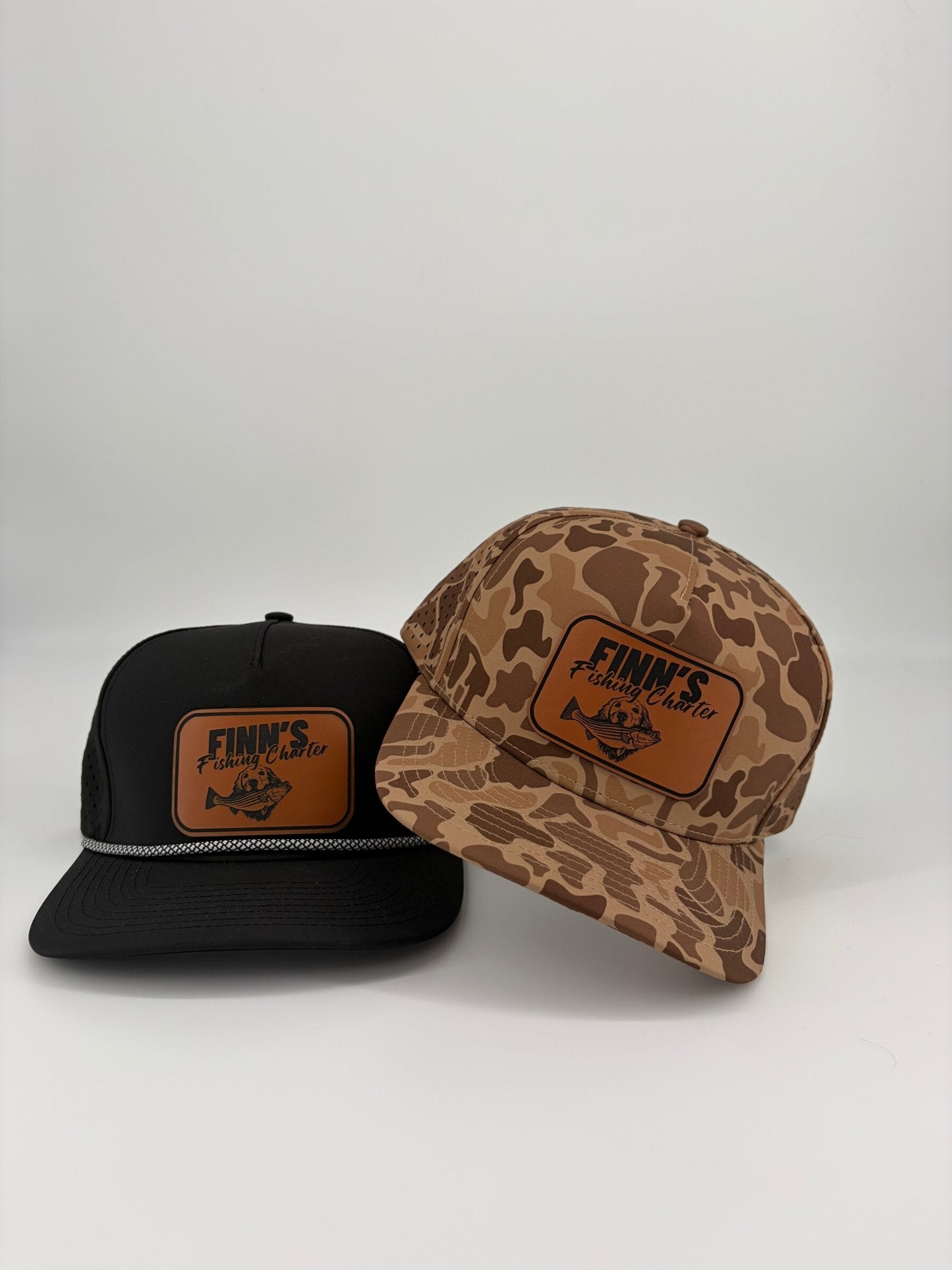 Original Finns Light Wood Camo Leather Logo Blackhawk Trucker Hat - Finn's Fishing Charter